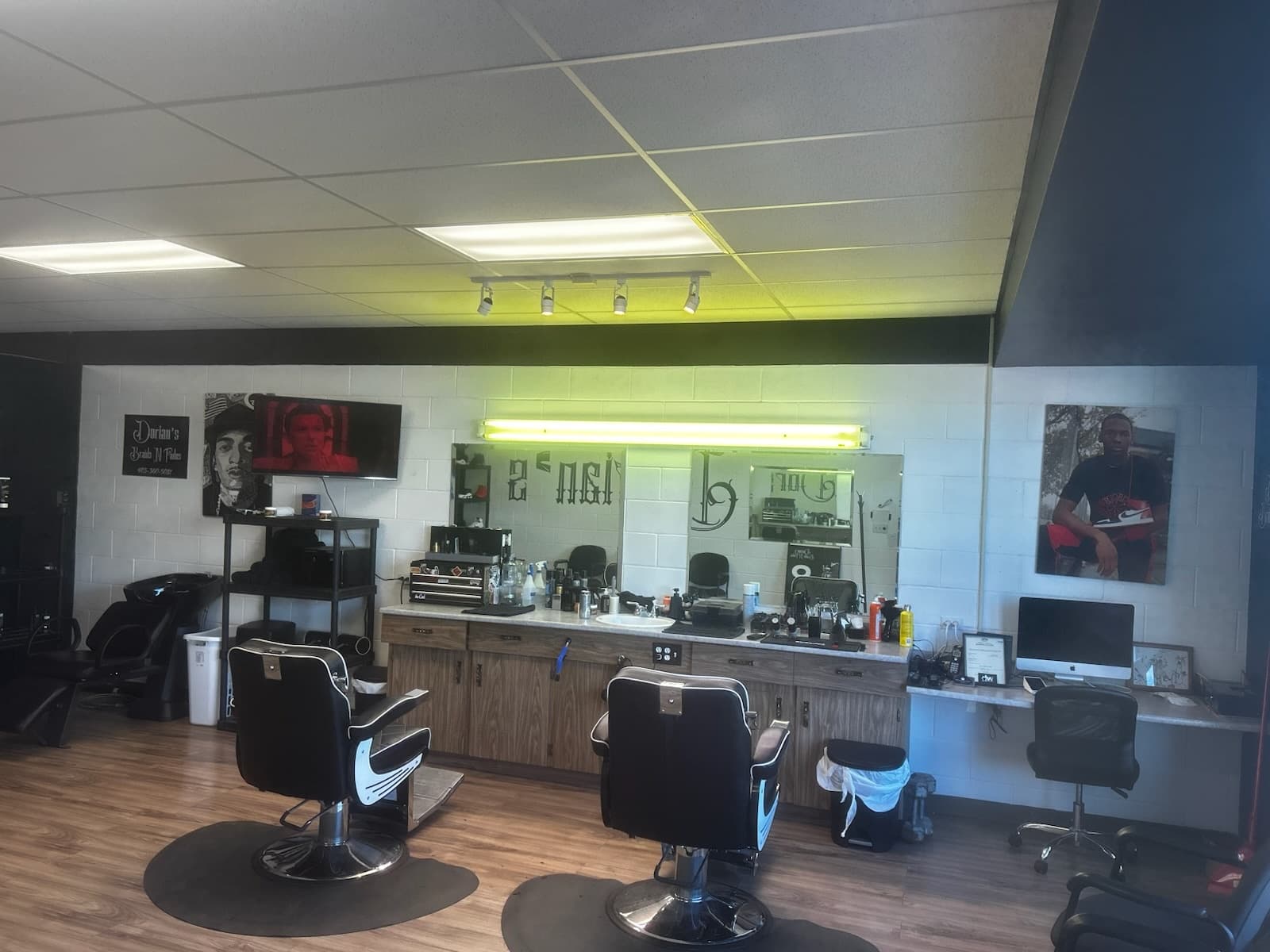 Dorian's Braids & Fades - interior barber chairs